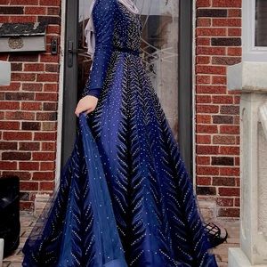 Gorgeous Navy Blue Ball Gown with unique detailing.